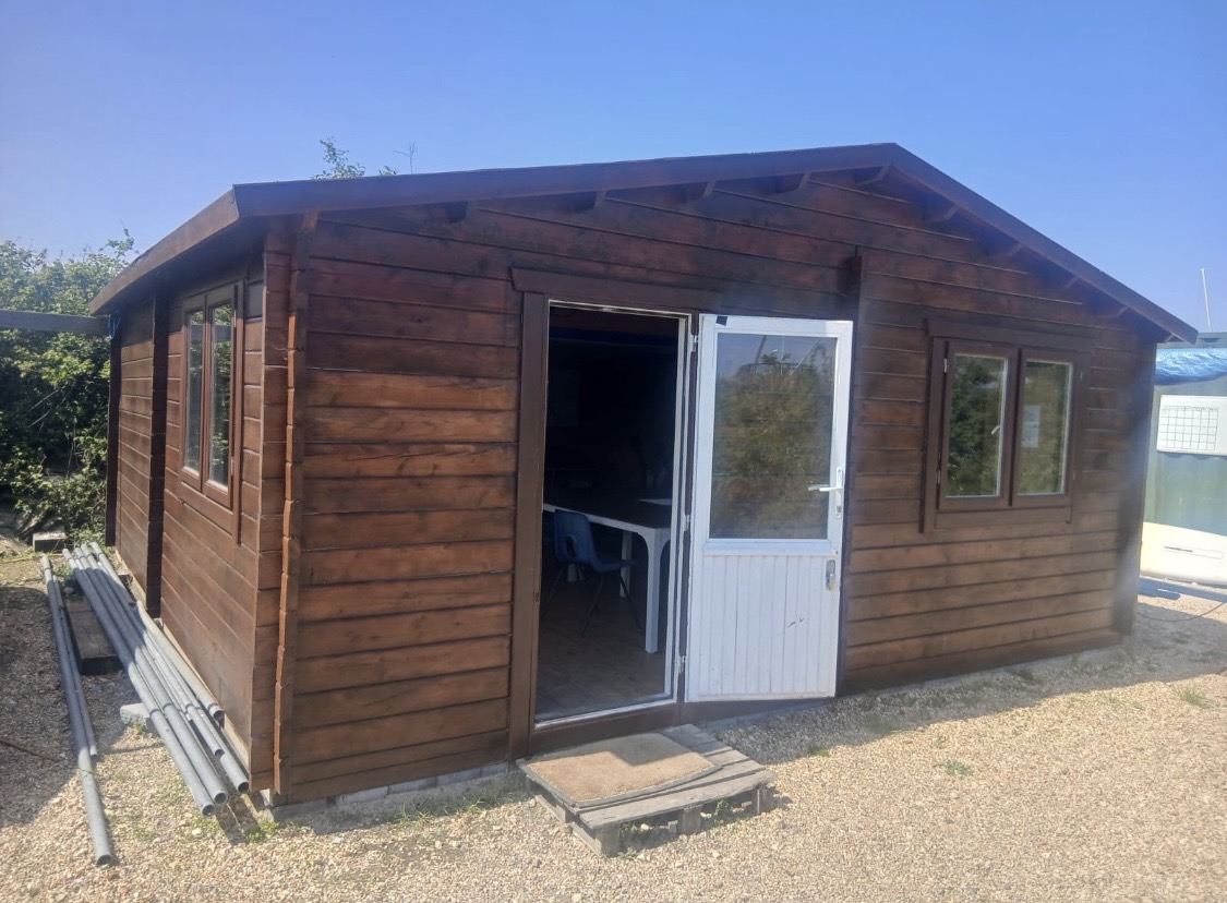 Large Log Cabin Demolition & Removal in Hayling Island before Hampshire Waste Clearance