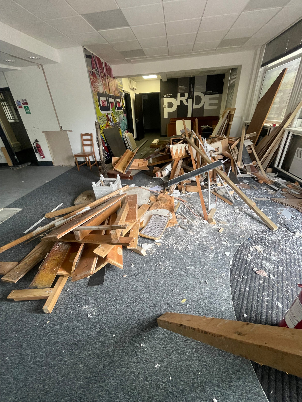 Before and after of a commercial waste removal job in Portsmouth, showing a room full of refurbishment debris and then the same room completely cleared.
