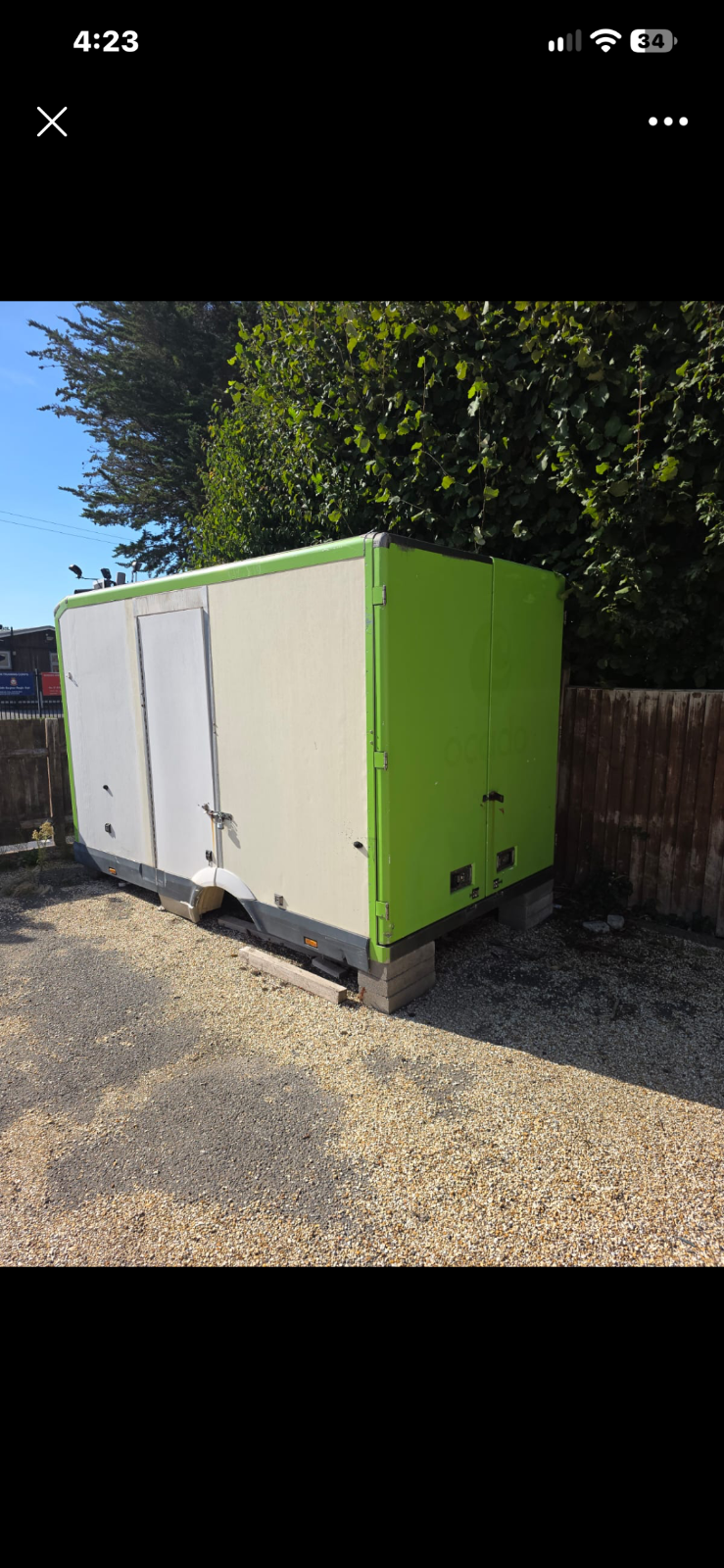 Before and after of a large fibreglass trailer body removal in Portsmouth by Hampshire Waste Clearance Services.